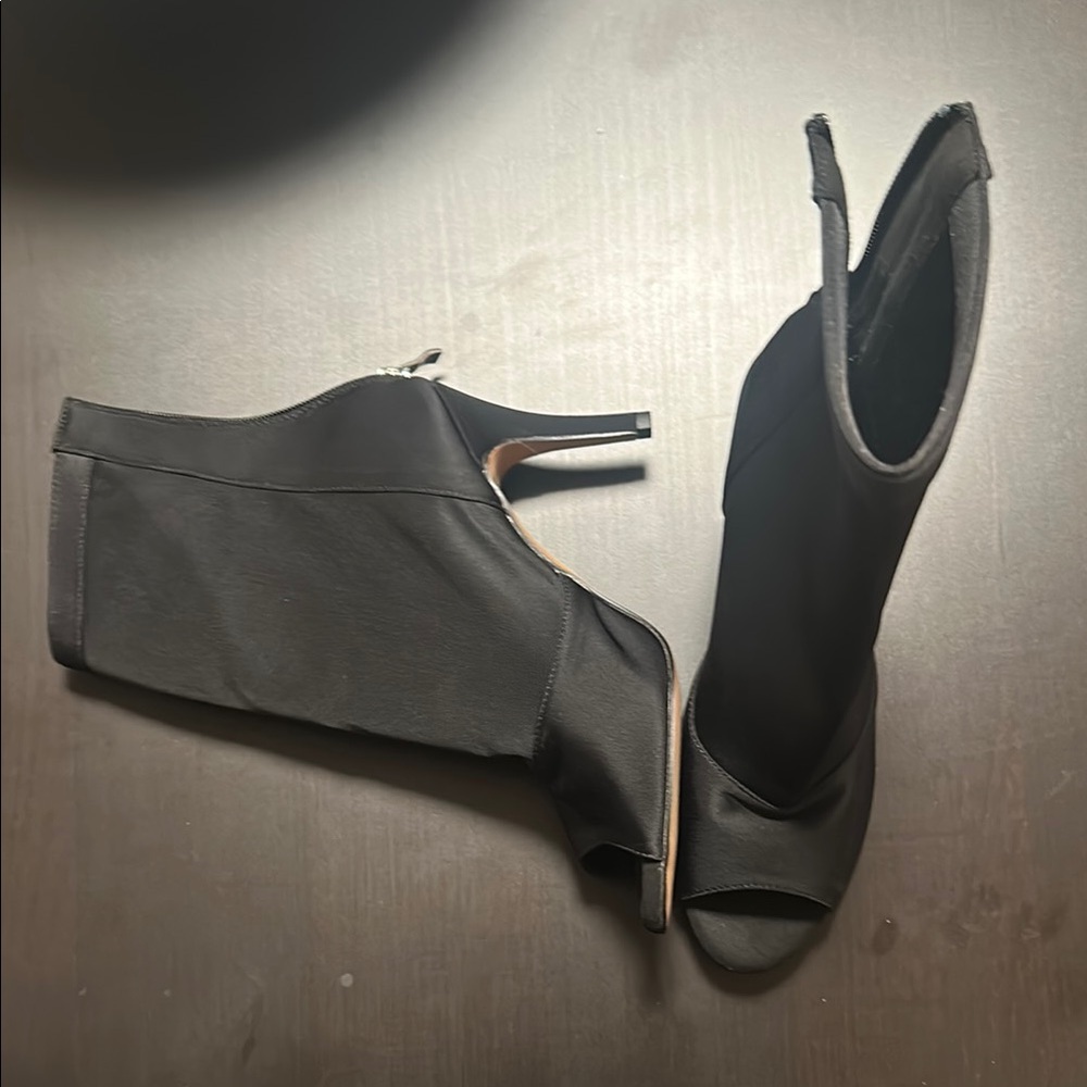 Sleek Black Heeled Boots with Open Toe